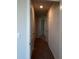 Carpeted hallway with multiple bedroom doors at 289 Blue Haw Dr, Moncks Corner, SC 29461