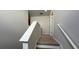 Upstairs hallway with carpeted flooring and access to bedrooms at 291 Blue Haw Dr, Moncks Corner, SC 29461