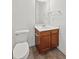 Simple bathroom with wood vanity and tiled floor at 3026 Gulfstream Ln, Ridgeville, SC 29472