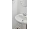 Convenient pedestal sink in a small half-bathroom at 3026 Gulfstream Ln, Ridgeville, SC 29472