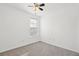 Bright bedroom with neutral carpeting and ceiling fan at 3026 Gulfstream Ln, Ridgeville, SC 29472