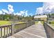 Wooden footbridge leading to community amenities at 3026 Gulfstream Ln, Ridgeville, SC 29472