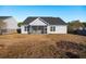 House exterior view with screened porch at 3026 Gulfstream Ln, Ridgeville, SC 29472