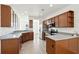 Kitchen with wood cabinets, granite counters, and stainless steel appliances at 3026 Gulfstream Ln, Ridgeville, SC 29472