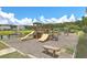 Community playground with slides and swings at 3026 Gulfstream Ln, Ridgeville, SC 29472