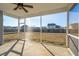 Screened porch overlooking backyard at 3026 Gulfstream Ln, Ridgeville, SC 29472