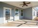 Covered screened porch with ceiling fan at 3026 Gulfstream Ln, Ridgeville, SC 29472