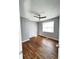 Bright bedroom featuring hardwood floors and ceiling fan at 348 Cleveland St, Walterboro, SC 29488