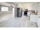 Eat-in kitchen with white cabinets and stainless steel appliances at 348 Cleveland St, Walterboro, SC 29488