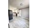 Kitchen with white cabinets, stainless steel appliances and wood-look floors at 348 Cleveland St, Walterboro, SC 29488