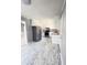 Updated kitchen featuring white cabinets and stainless steel appliances at 348 Cleveland St, Walterboro, SC 29488