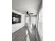Bright sunroom featuring gray walls and wood-look floors at 348 Cleveland St, Walterboro, SC 29488