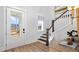 Stylish entryway with staircase and light wood flooring at 358 Trailmore Ln, Summerville, SC 29486