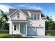 Charming farmhouse exterior with two-car garage and landscaped yard at 358 Trailmore Ln, Summerville, SC 29486