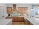 Open concept kitchen with island, farmhouse sink, and breakfast bar at 358 Trailmore Ln, Summerville, SC 29486