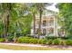 Two-story home with front porch and manicured hedges at 376 Beresford Woods Ln, Charleston, SC 29492