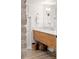 Modern bathroom with floating vanity, glass shower, and white tile at 38 Hasell St, Charleston, SC 29401