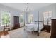 Bright bedroom featuring a comfortable bed and ample natural light at 38 Hasell St, Charleston, SC 29401