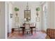 Charming dining room with hardwood floors and French doors at 38 Hasell St, Charleston, SC 29401