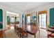 Spacious dining room with a large table and access to other rooms at 38 Hasell St, Charleston, SC 29401