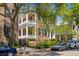 Brick home with white columns, balconies, and a gated entrance at 38 Hasell St, Charleston, SC 29401