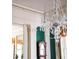 Elegant interior with crystal chandelier and ornate trim at 38 Hasell St, Charleston, SC 29401