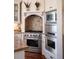 Modern kitchen with stainless steel appliances and granite counters at 38 Hasell St, Charleston, SC 29401