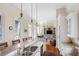 Open kitchen boasts granite countertops, stainless steel appliances, and an island at 38 Hasell St, Charleston, SC 29401