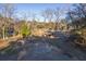 Aerial view of a rustic barn and paddock at 3980 River Rd, Johns Island, SC 29455