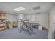Basement room with musical instruments and shelving at 3980 River Rd, Johns Island, SC 29455