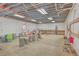 Unfinished basement with exposed ceiling and storage items at 3980 River Rd, Johns Island, SC 29455