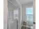 Clean bathroom with a glass shower and tile surround at 3980 River Rd, Johns Island, SC 29455