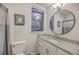 Clean bathroom with granite countertop vanity, large mirror, and shower/tub combo at 3980 River Rd, Johns Island, SC 29455