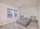 Spacious bedroom with a queen-size bed and plenty of natural light at 3980 River Rd, Johns Island, SC 29455
