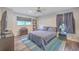 Cozy bedroom with ample natural light and built in shelving at 3980 River Rd, Johns Island, SC 29455