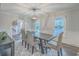 Spacious dining room with hardwood floors and wainscoting at 3980 River Rd, Johns Island, SC 29455