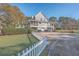 House exterior with white fence and circular driveway at 3980 River Rd, Johns Island, SC 29455