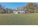 Two story home with wrap around porch and spacious yard at 3980 River Rd, Johns Island, SC 29455