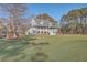 Two story home with wrap around porch and spacious yard at 3980 River Rd, Johns Island, SC 29455