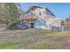 Gray barn with garage door and upper deck at 3980 River Rd, Johns Island, SC 29455