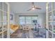 Bright home gym with Peloton bike and natural light at 3980 River Rd, Johns Island, SC 29455