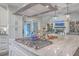 Bright kitchen with an island and stainless steel appliances at 3980 River Rd, Johns Island, SC 29455