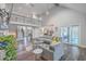 High-ceilinged living area with gray sectional and built-ins at 3980 River Rd, Johns Island, SC 29455