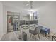 Home office featuring a desk with triple monitors and a comfortable lounge chair at 3980 River Rd, Johns Island, SC 29455