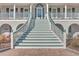 Elegant stairway leading to front door at 3980 River Rd, Johns Island, SC 29455