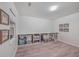 Bright storage room with built-in shelving and ample space for organization at 3980 River Rd, Johns Island, SC 29455