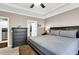 King size bed with view into bathroom and laundry room at 455 Switchgrass Dr, Summerville, SC 29486