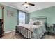 Light and airy bedroom with a metal bed frame and soft color palette at 455 Switchgrass Dr, Summerville, SC 29486