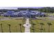 Community clubhouse with landscaping and palm trees at 455 Switchgrass Dr, Summerville, SC 29486