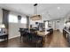 Dining room with hardwood floors and a farmhouse table at 455 Switchgrass Dr, Summerville, SC 29486